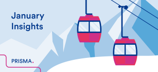 ski lift in front of hills with snow